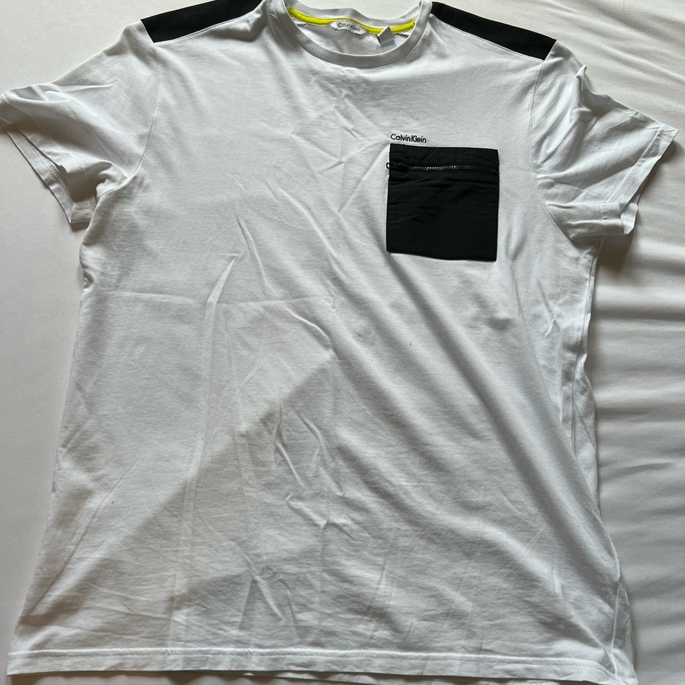 Calvin Klein t shirt with zippered pocket size medium, white and black